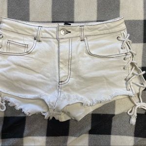 H&M White Lace Up short shorts.